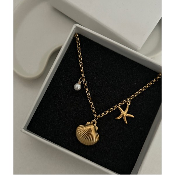 Collier charms coquillage et étoile de mer acier inoxydable or OCEANA