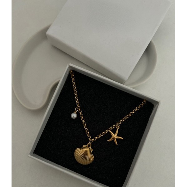 Collier charms coquillage et étoile de mer acier inoxydable or OCEANA